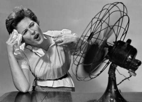 Hot flashes - Menopause / perimenopause woman in front of fan #perimenopause