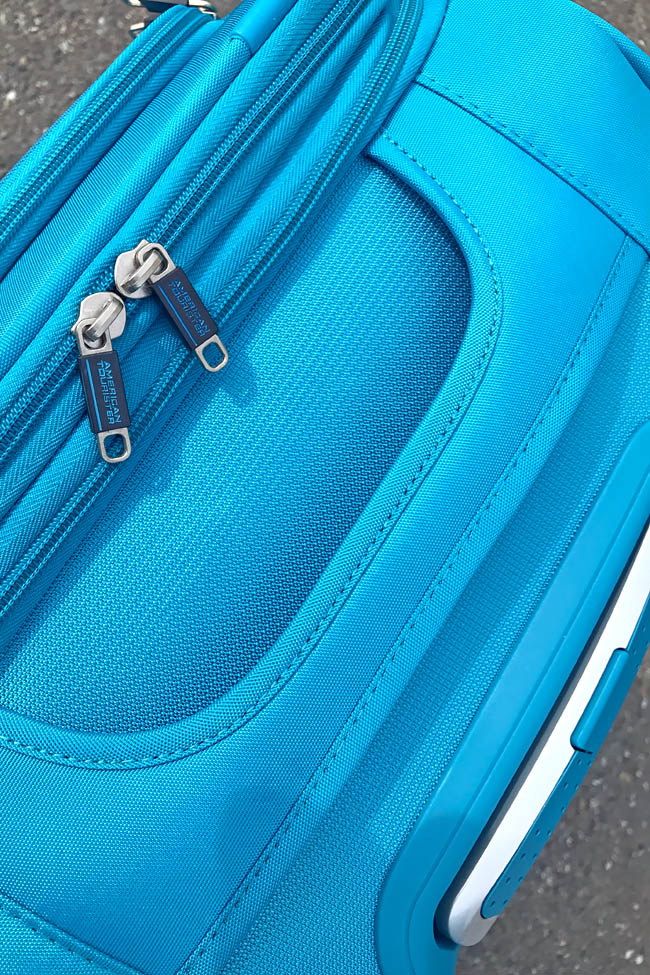 Cookies & Clogs | Travel | When flying, especially if you're doing international travel, it can be frustrating to meet baggage allowance limits and stay under a specific luggage weight. Using lightweight suitcases like the American Tourister iLite Max collection.