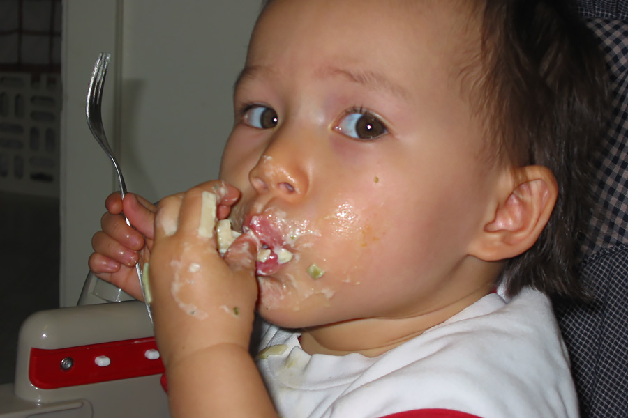 Cookies & Clogs | Everything changes when you have kids. Parenthood makes you do and say things you never thought you'd do when raising children. See how our parenting experience has gone and what two things have helped with cleaning up their messes. Toddler with messy face while eating.