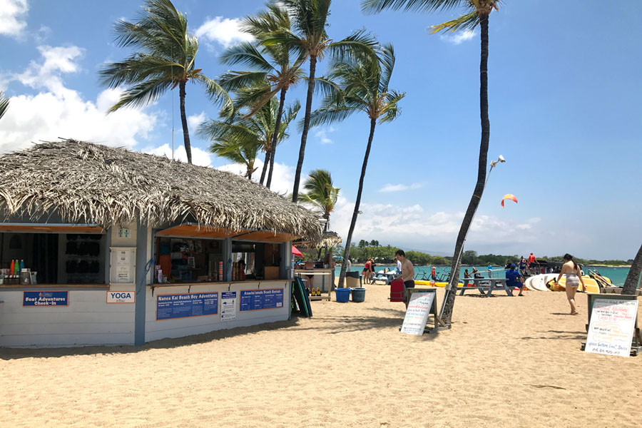 Cookies & Clogs | Oceans Sports Aloha Days offer 4 hours of unlimited water sports beach equipment including kayaks, stand-up paddleboards, snorkel gear, and rides on the glass bottom boat. One of the many things to do on the Big Island of Hawaii with kids.