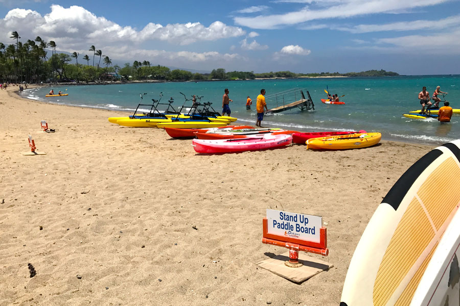 Cookies & Clogs | Oceans Sports Aloha Days offer 4 hours of unlimited water sports beach equipment including kayaks, stand-up paddleboards, snorkel gear, and rides on the glass bottom boat. One of the many things to do on the Big Island of Hawaii with kids.
