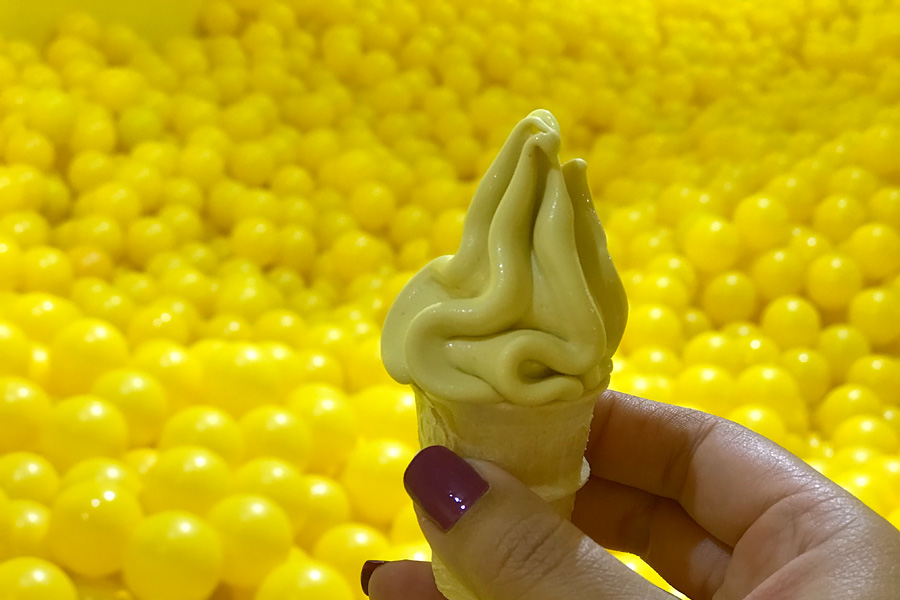 Color Factory in San Francisco, CA. Yellow room ball pit with ice cream