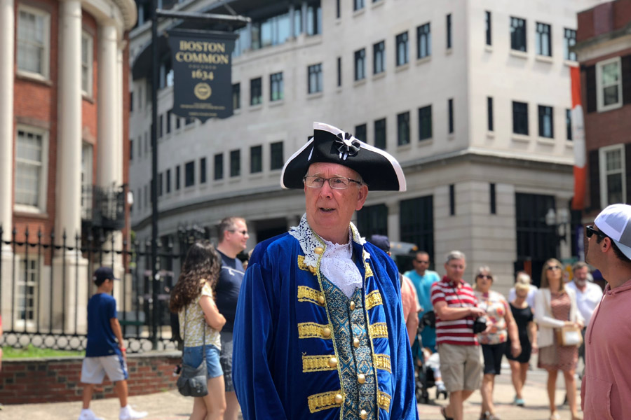 Family travel tips for visiting the Boston Freedom Trail in Boston, Massachusetts with historic sites - Boston common costume man