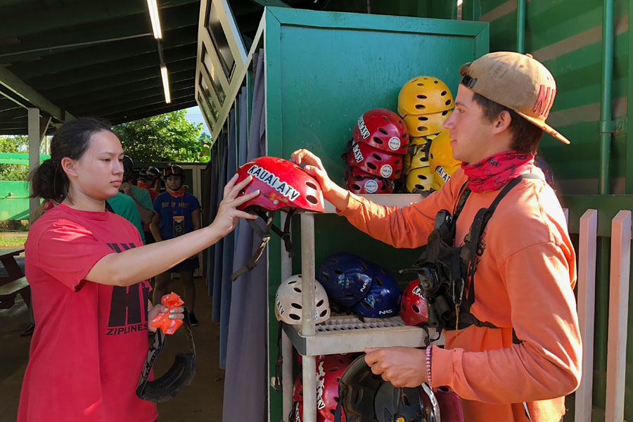 Kauai ATV Waterfall tour with family / teens in Ohana Bug in Kauai Hawaii Getting helmets, goggles, and clothes