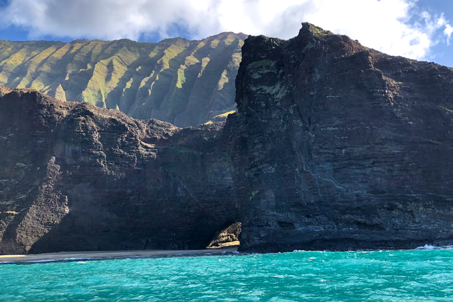 Top things to do in Kauai Hawaii — Kauai Napali Coast boat tour / Na Pali Coast sunset cruise Arch Pirates of Caribbean